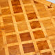 Square Italian coffee table with burl wood and inlaid parquetry top