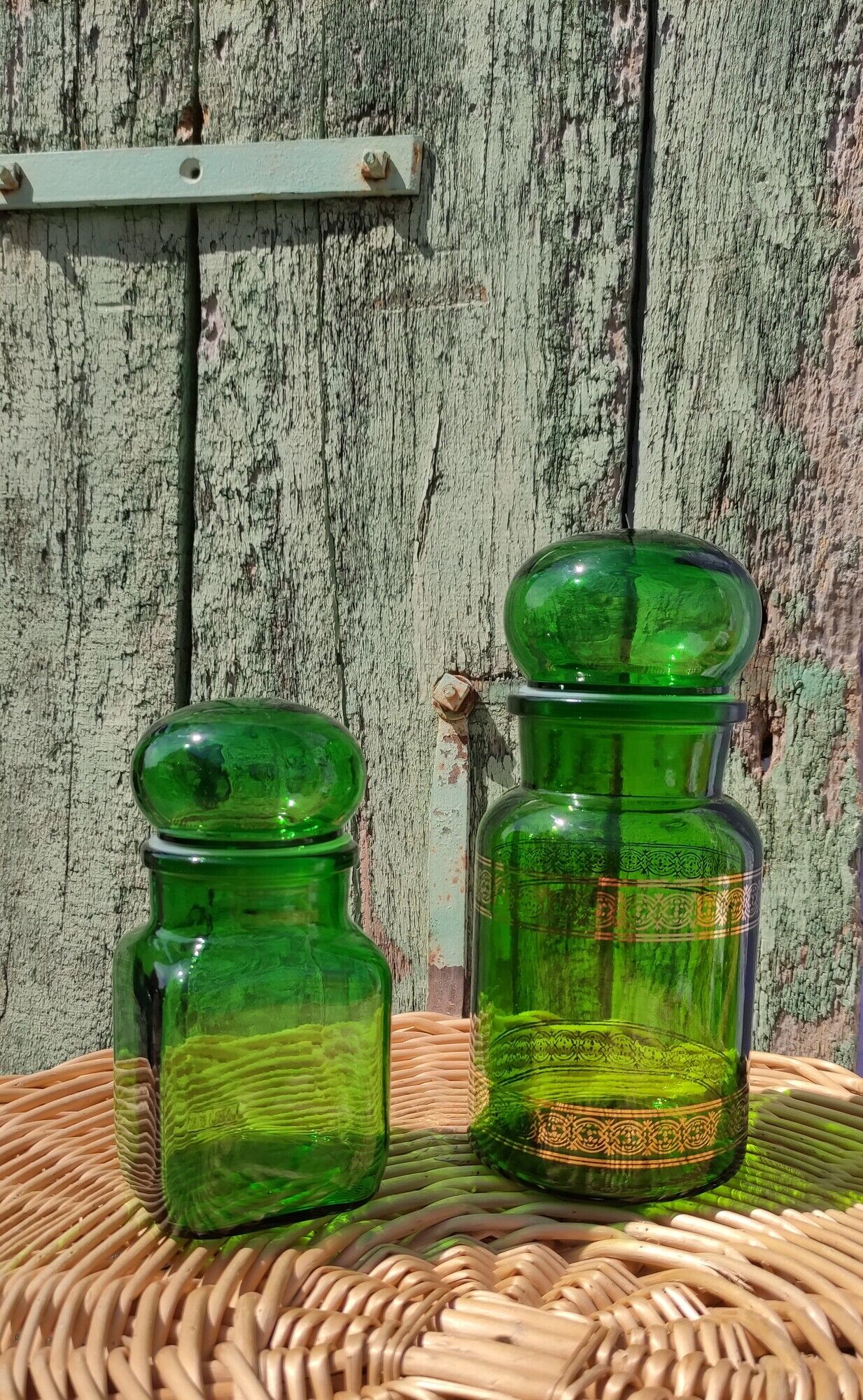 Duo of pots and jars apothecary style in green glass.