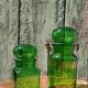 Duo of pots and jars apothecary style in green glass.