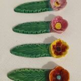 4 porte-couteaux fleurs signés vintage
