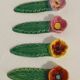 4 vintage signed flower knife rests