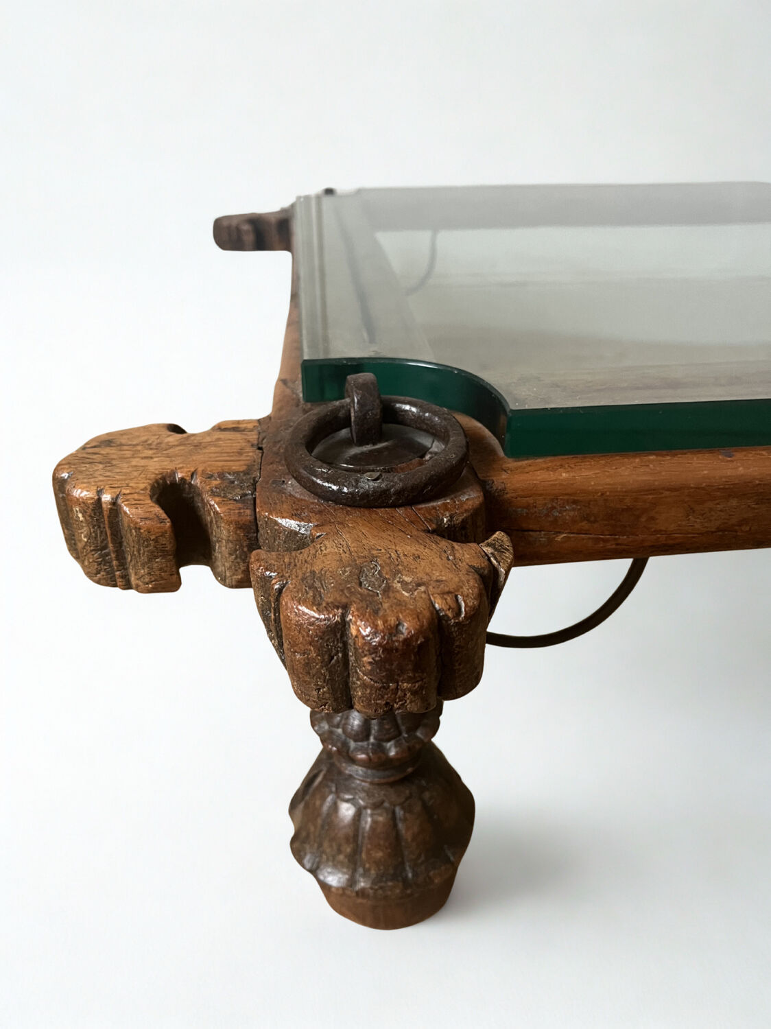 Indian coffee table made of wood and wrought iron.