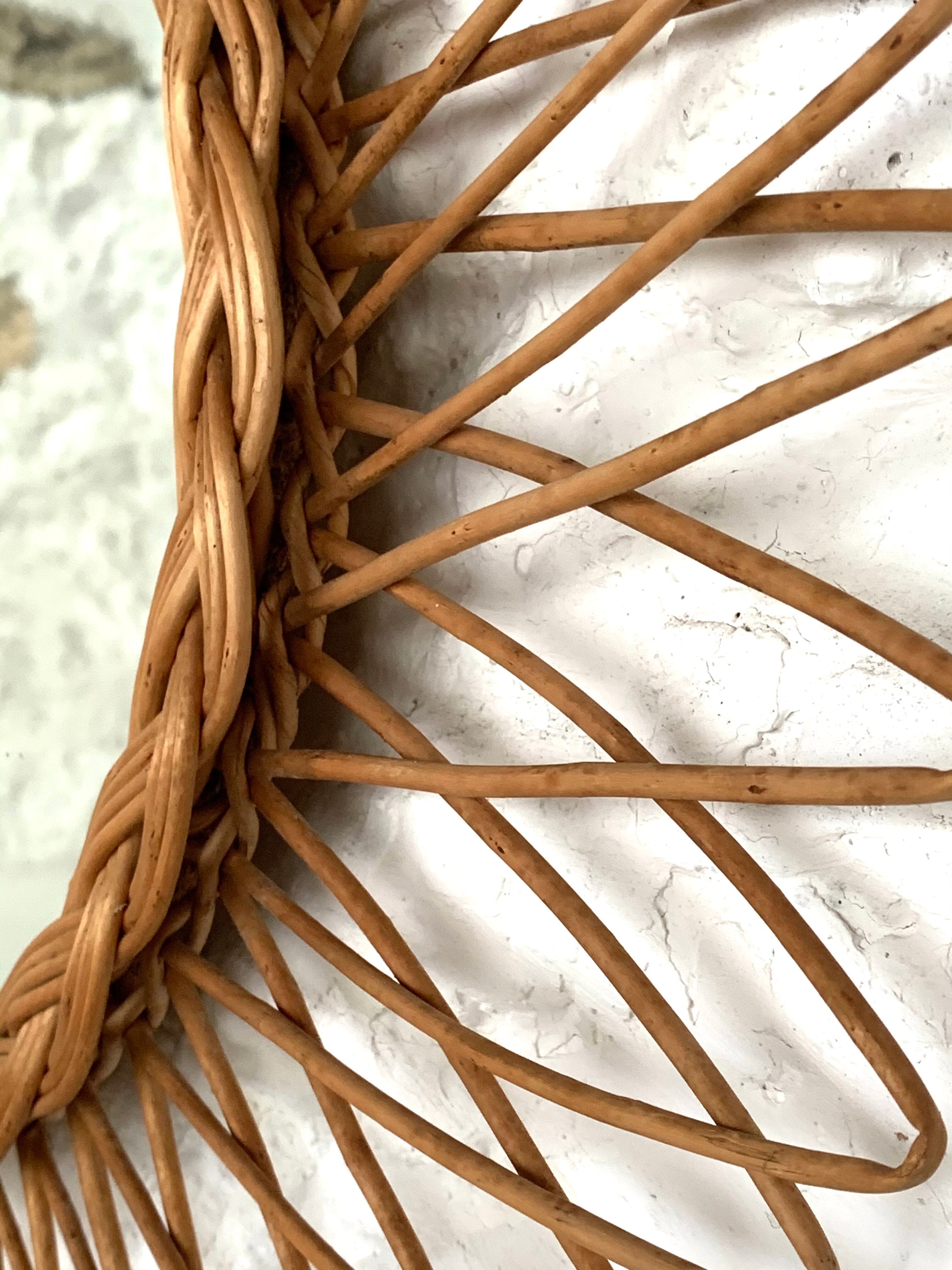 Vintage rattan sun mirror