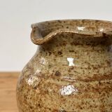 Small beige speckled stoneware pitcher