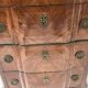 Transitional style chest of drawers in rosewood and amaranth veneer, 20th century.