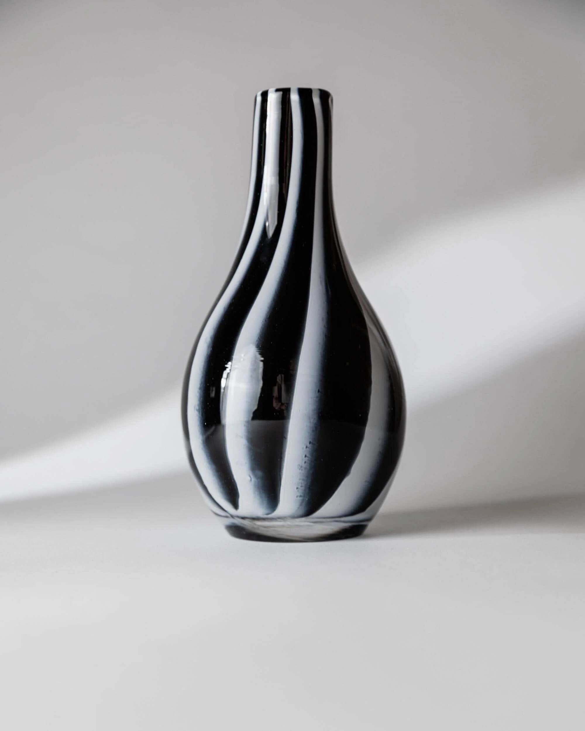 Vintage Murano glass vase from the 1980s, black and white swirl pattern, thick Italian art glass.