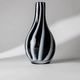 Vintage Murano glass vase from the 1980s, black and white swirl pattern, thick Italian art glass.