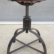 Bienaise stool of the years 1935, model 203 with 4 flat iron cathedral legs joined by a