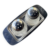 Vintage glass and chrome salt and pepper shaker set.