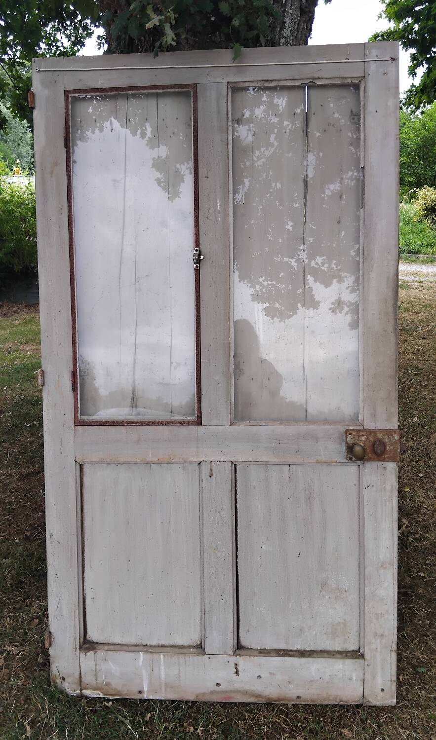Old door with vintage wooden shutters