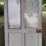 Old door with vintage wooden shutters