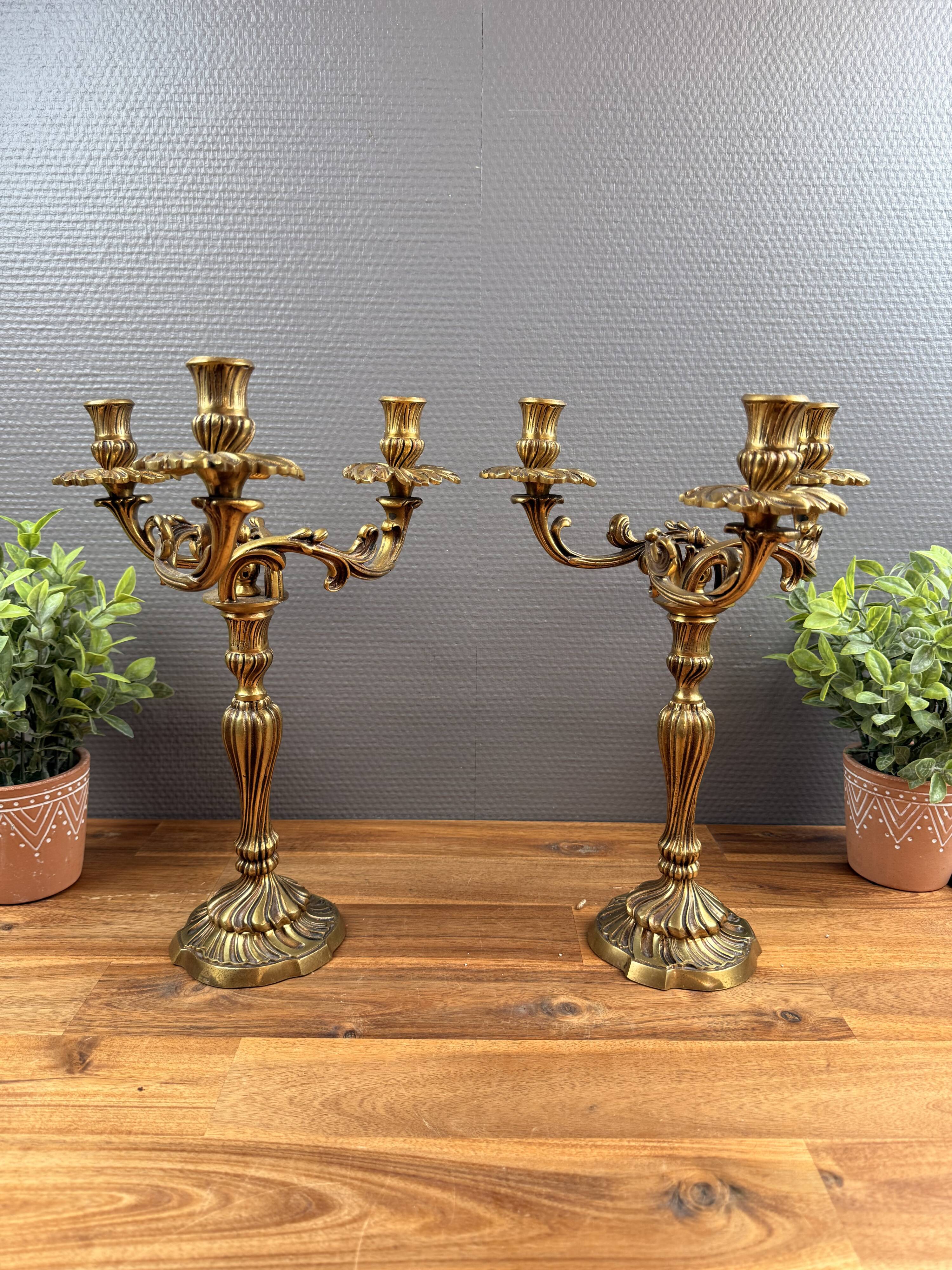Pair of antique bronze candlesticks, Louis XV style