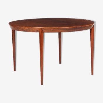 Round teak dining table