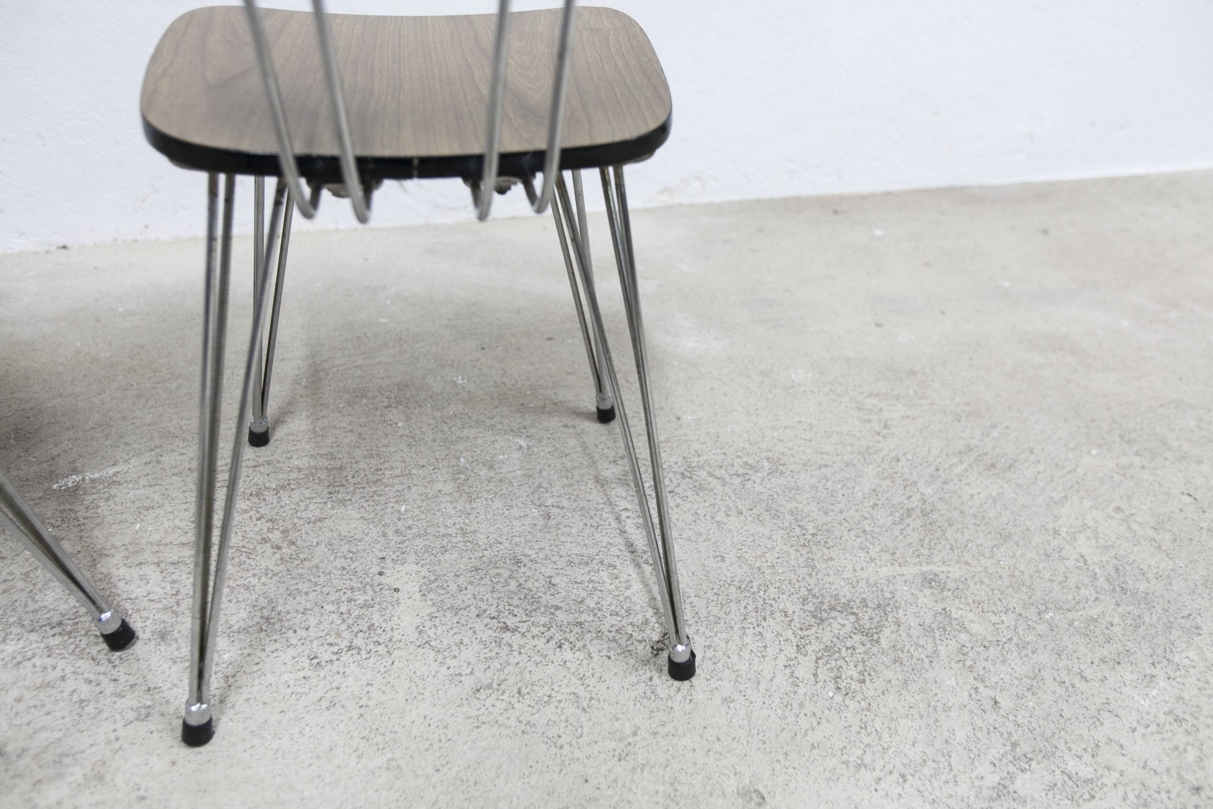 Pair of Formica 1970 brown Eiffel feet chairs