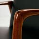 Teak armchair with leather upholstery