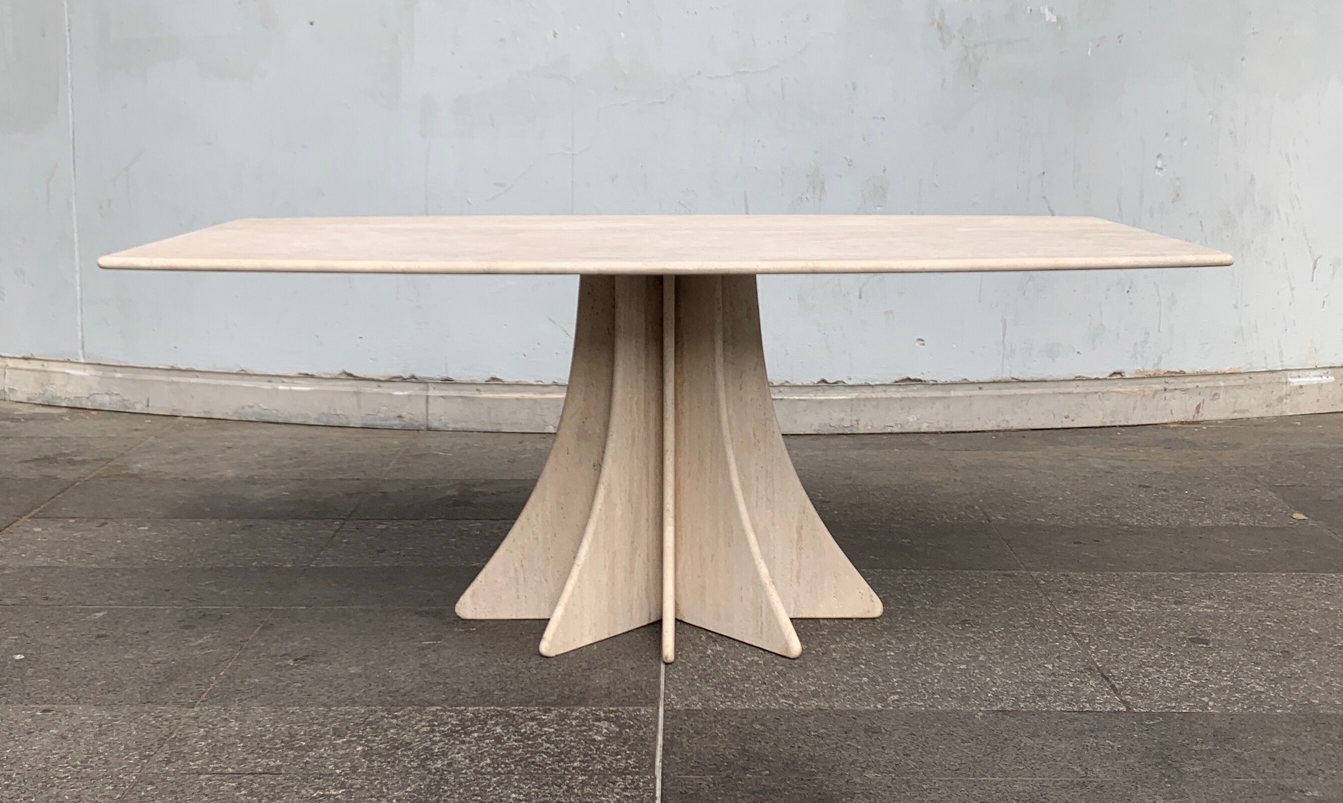 Travertine dining table by Claude Berraldacci with 8-sided stand