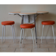 Entire table folding and stools orange and white formica 60s