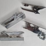 Set of four art deco knife holders after Benjamin Rabier, 1930