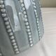 Large vintage pitcher in crackled celadon ceramic, beaded decoration.
