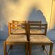 4 vintage chairs made of solid wood and woven straw