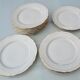 Set of 12 flat plates made of Limoges porcelain