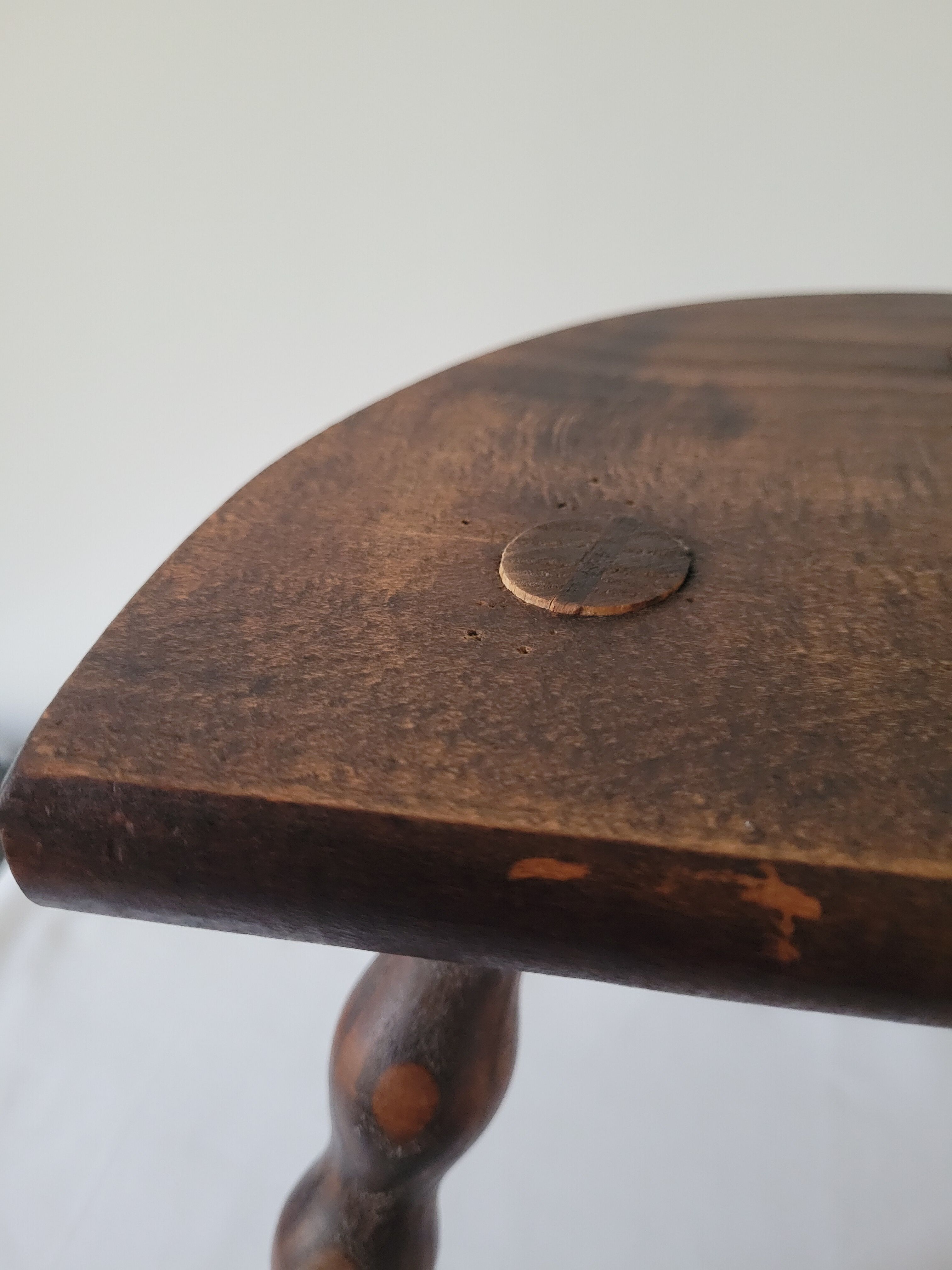 Tripod stool with turned wooden legs