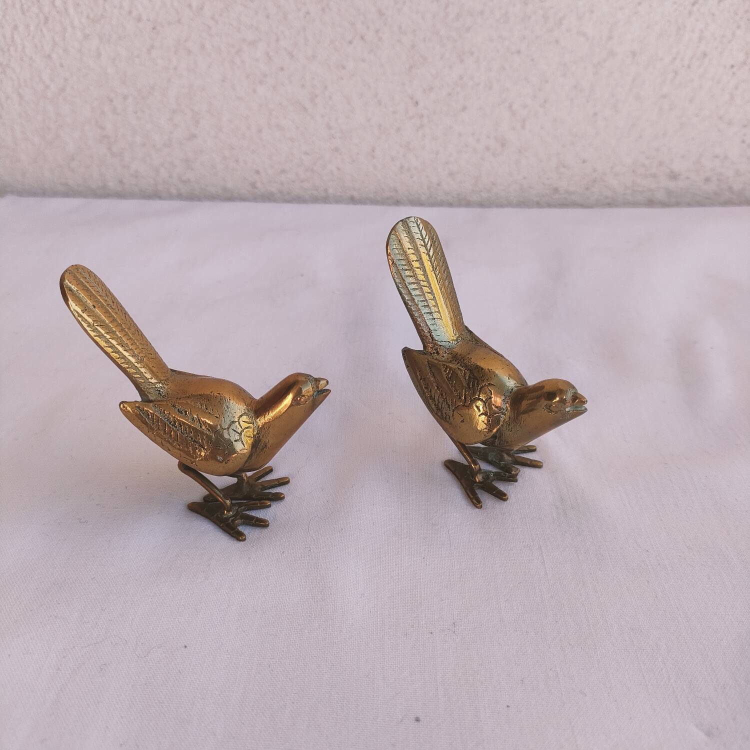 Pair of small brass birds