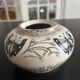 ceramic vase decorated by the artist René Poirot