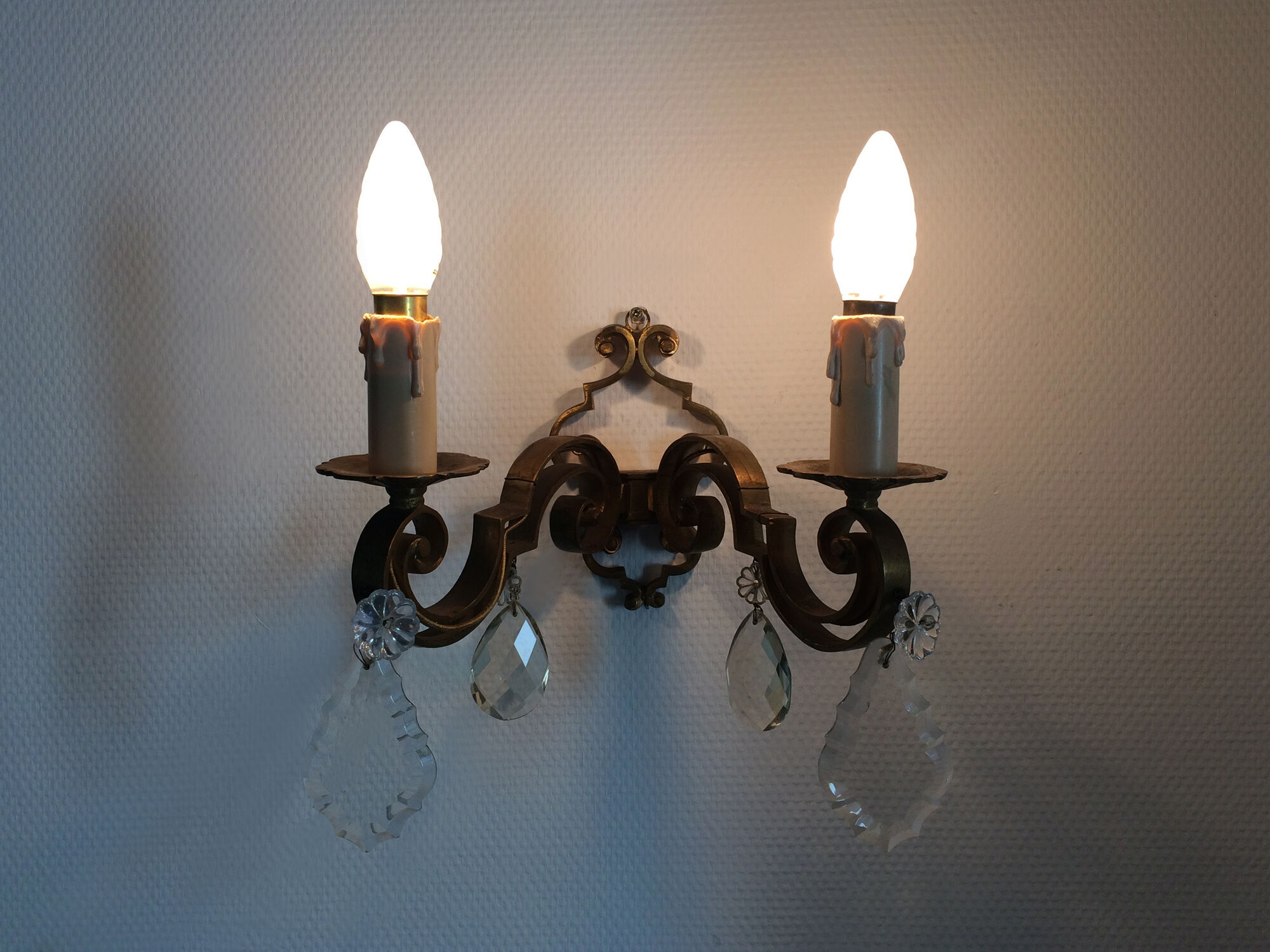 Former pair bronze wall sconces with double lights and tassels. Art Deco period