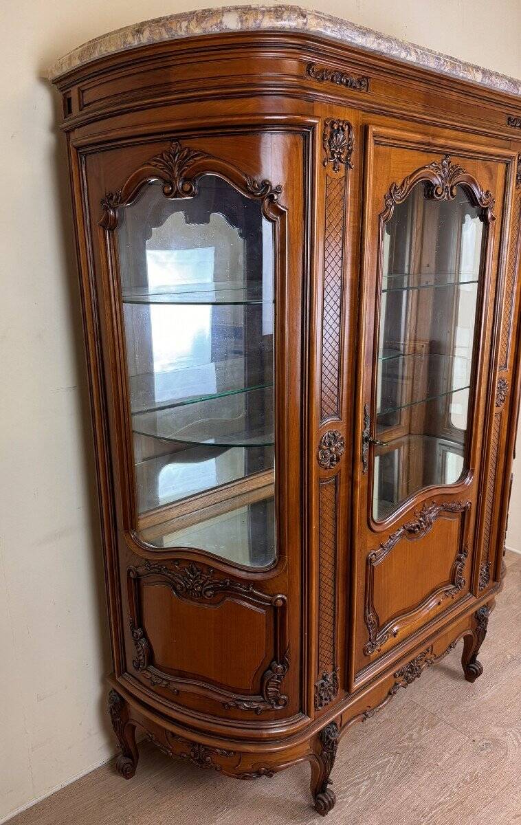 Louis XV Provençal style bookcase in half-moon shape in cherry wood circa 1930