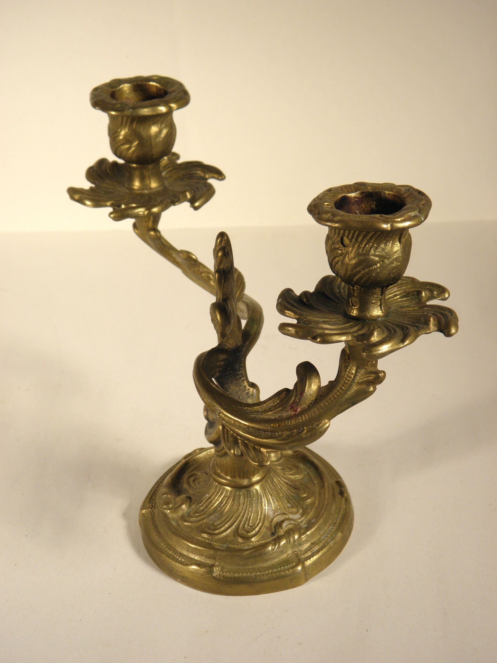 Two-branched candlestick in gilded bronze