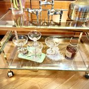 Titre  Desserte Hollywood Regency chrome & verre – années 70