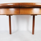 Dining table with extension in teak of danish design from the 1960s.