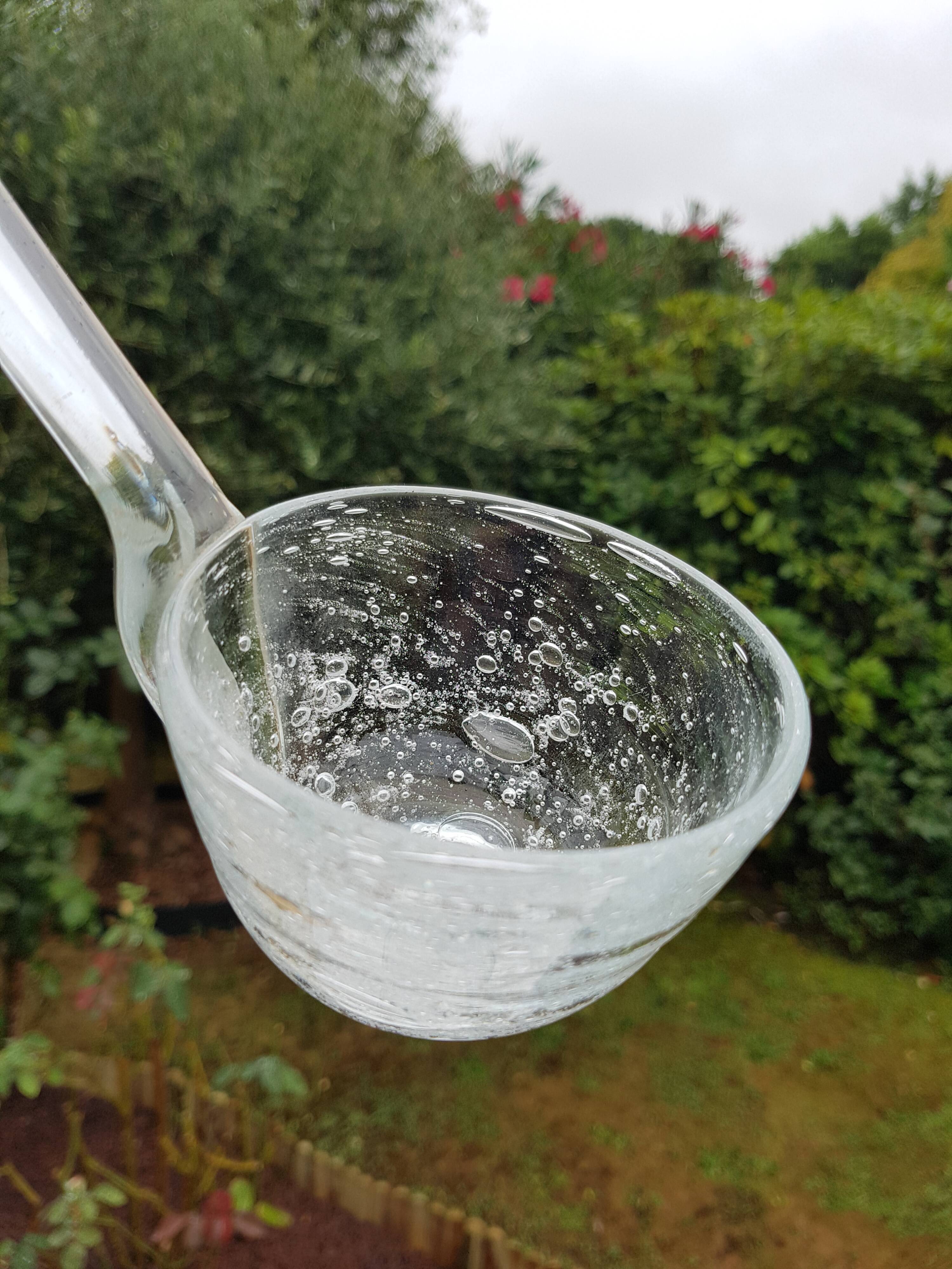 Biot bubbled glass sangria cut with ladle