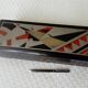 Old lacquered wooden glove box/box with Art Deco geometric decoration. Japan