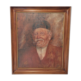 Painitng with its frame the man in chapeau and a la pipe