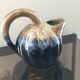 Ceramic melon jug signed