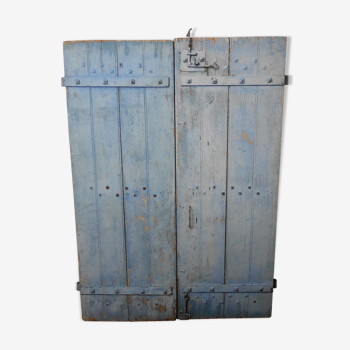 Old pair of flaps in blue channel cart