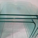 Suite of 3 nesting tables in curved glass from the 80s.