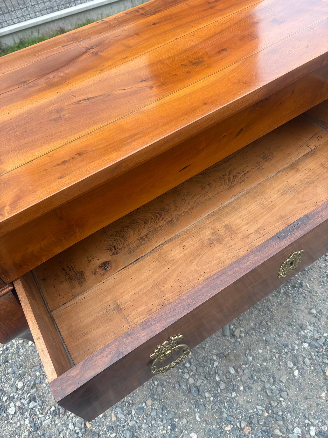 Restoration period walnut chest of drawers with a scroll handle