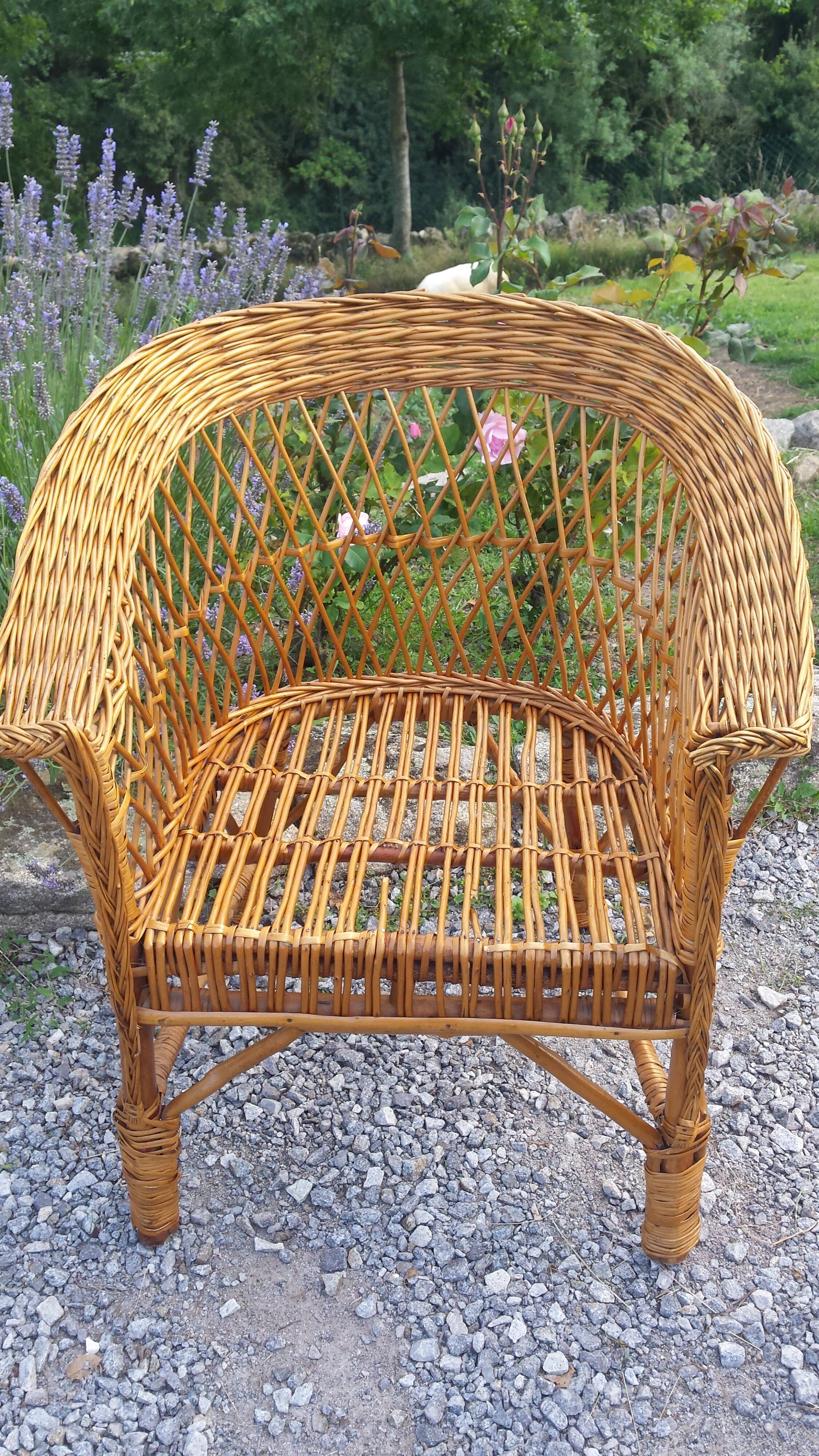 Wicker or rattan armchairs