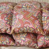 Small quilt filled with paisley pattern feathers