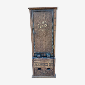 Ovill's 1900 gold flakes cigarette dispenser