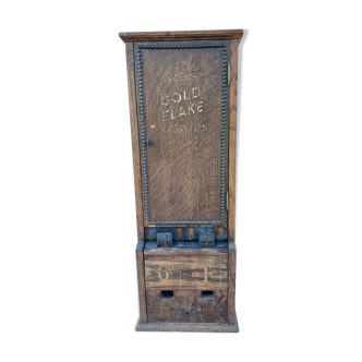 Ovill's 1900 gold flakes cigarette dispenser