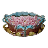 Old barbotine planter with flower patterns