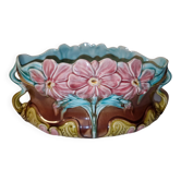 Old barbotine planter with flower patterns