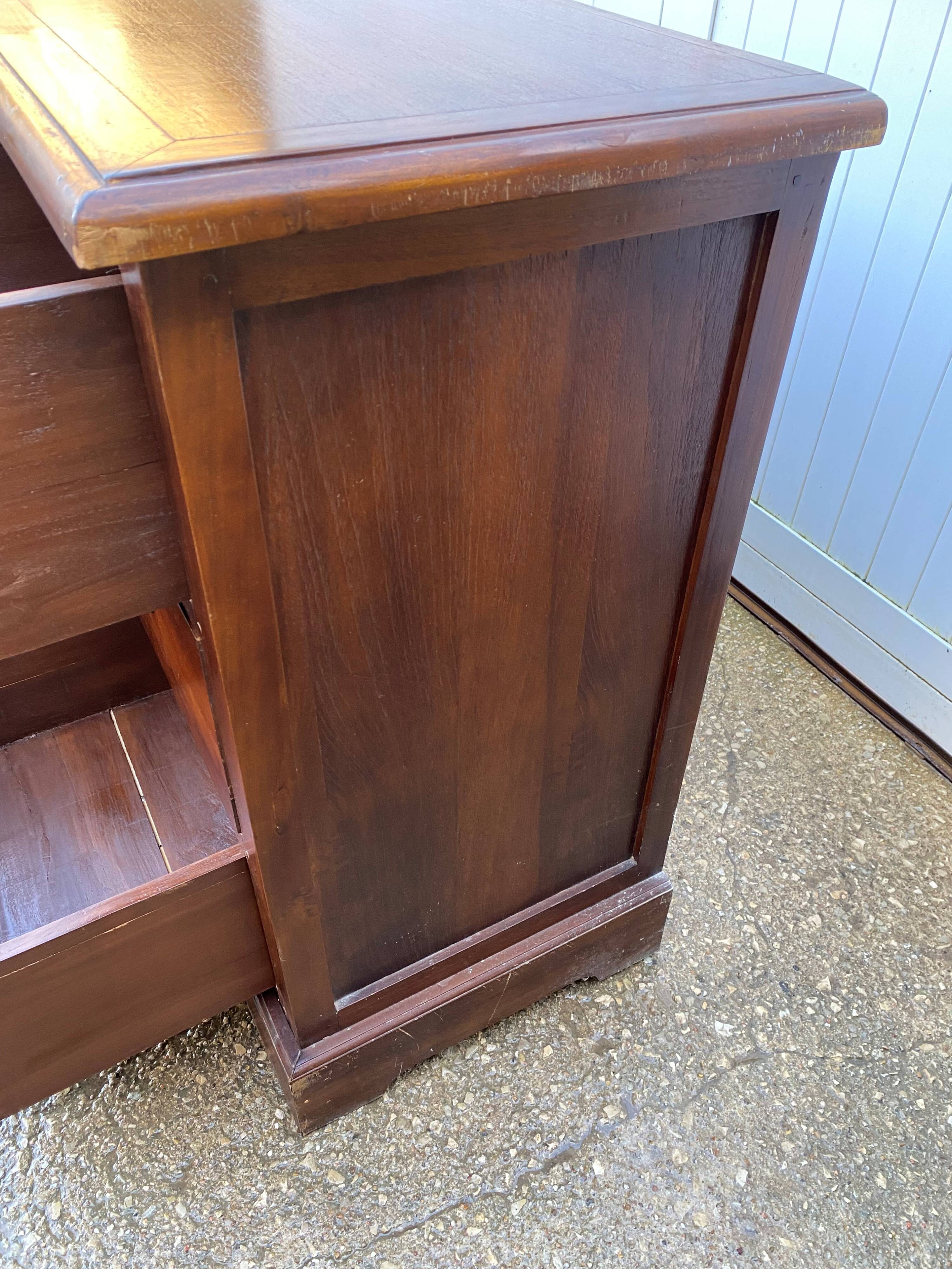 Old and authentic trade storage unit counter with 12 large drawers in cherry wood 1950