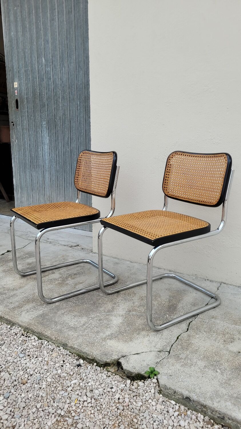 Pair of chairs by Marcel Breuer in black canework model B32 signed Italy