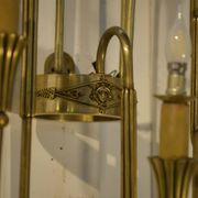 Monumental bronze wall light with 5 arms, neoclassical Art Deco from the 1940s.