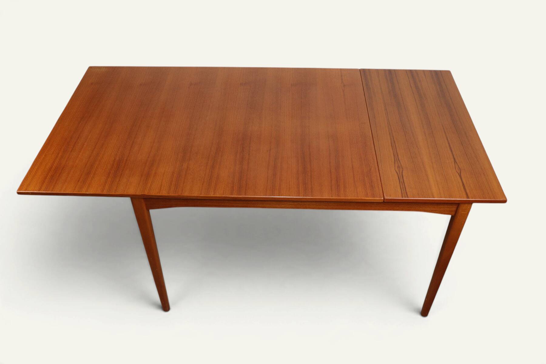 Rectangular extendable dining table in Scandinavian teak – 1960s